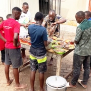 Former street boys making lunch for the younger boys