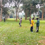 Former street children playing in a park together