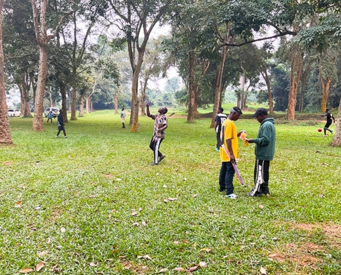 Former street children playing in a park together