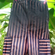 Hand-made trousers by a former street child
