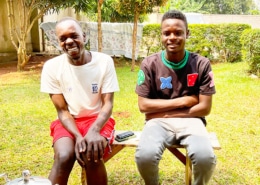 One of the charity workers with a boy at George's Place