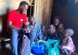Charity worker visiting one of the boy's family