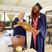 Faiza receiving her catering certificate in Uganda