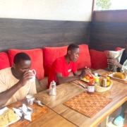 Former street children out for lunch with one of the charity workers