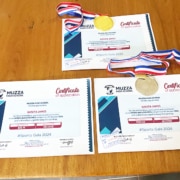 A boy from the streets of Kampala earns awards and certificates