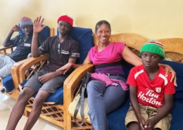 Reina, a visitor at the charity, with some of the boys