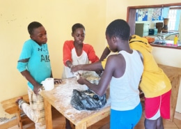 Former street children cooking together