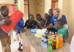 Birthday cake cutting for Jade, the social worker