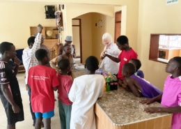 Janes cutting her birthday cake at George's Place