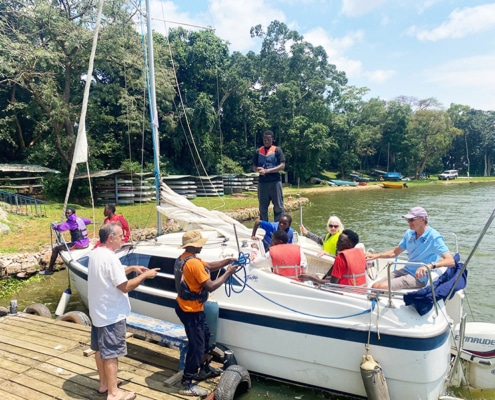 Jane and boys board the sailing boat