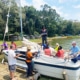 Jane and boys board the sailing boat