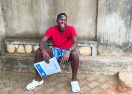 Former street boy at the charity having taken his school exams