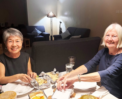 Jane and Christine enjoying a meal