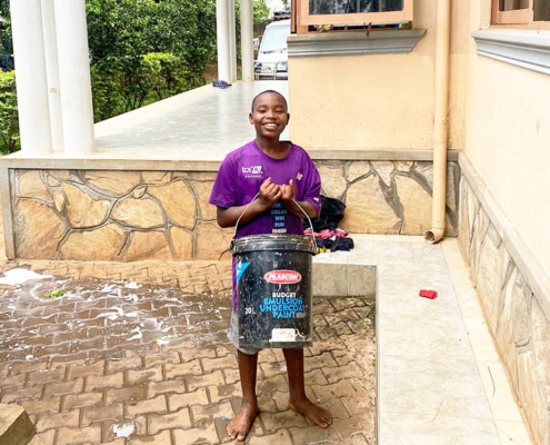 Smiling former homeless boy at Homes of Promise