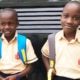 Two street boys from Kampala going to school in 2017