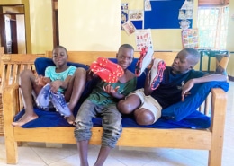 Boys very happy with donated football boots