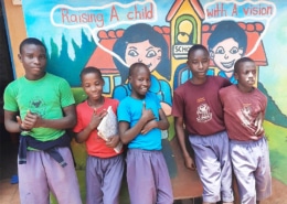 Five of the former homeless boys at school