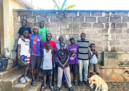 Boys at the charity home welcoming someone back