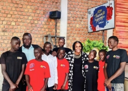 Boys from the charity visiting Pastor Phionah