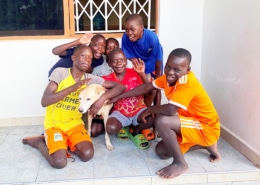 New arrivals at the charity, playing with the older boys