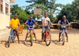 New boys at George's Place learning to ride their bikes