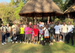 The staff, boys, and charity workers at Eagles Nest