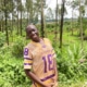 Former street boy Augustine, who's now grown up and working as a builder
