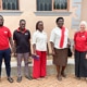 Charity staff meeting with Jane, Tresor, Benard, Petra, and Peace